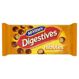 00874-05 MCVITIES DIGESTIVE NIBBLES CARAMEL ( MILK CHO.COATED BIS.BALLS WITH CARAMEL FLAVOUR ) (12X12) 144X37G